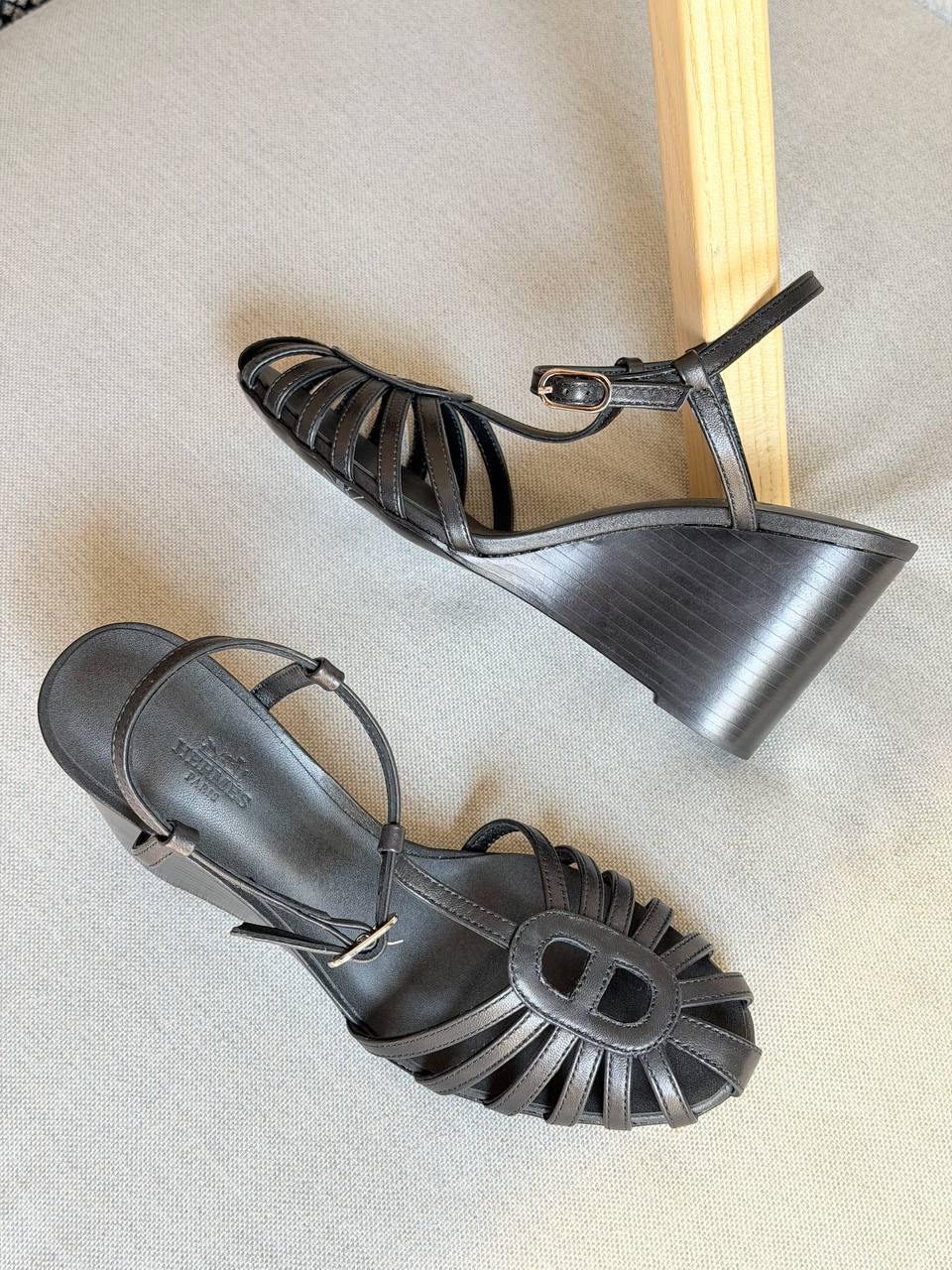 Hermès Noa 95 sandals featuring a wedge heel and the signature