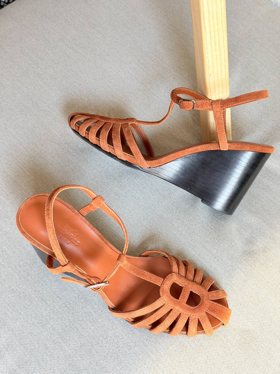 Hermès Noa 95 sandals featuring a wedge heel and the signature