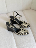 Hermès Noa 95 sandals featuring a wedge heel and the signature