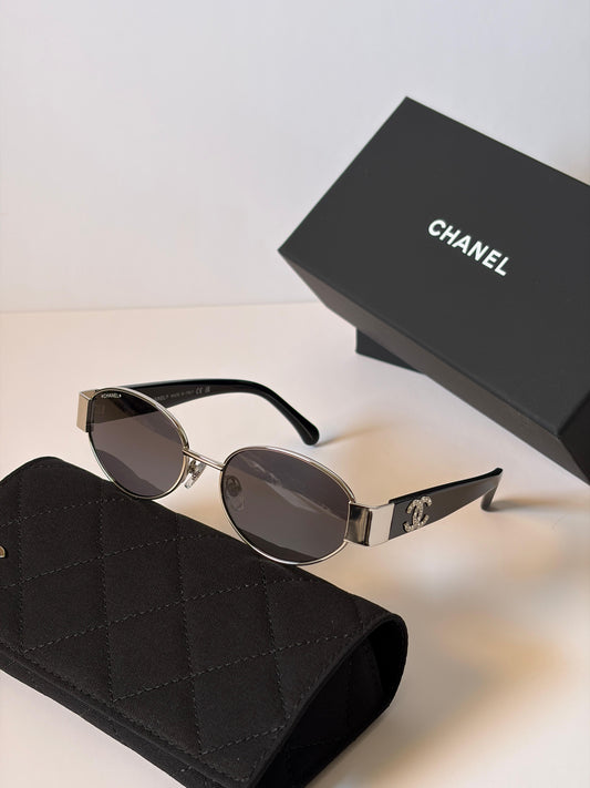 CHANEL Sunglasses: Oval