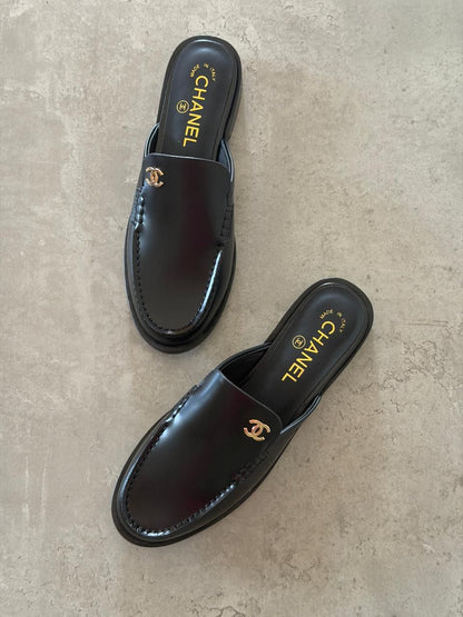 Chanel Mules in Black leather
