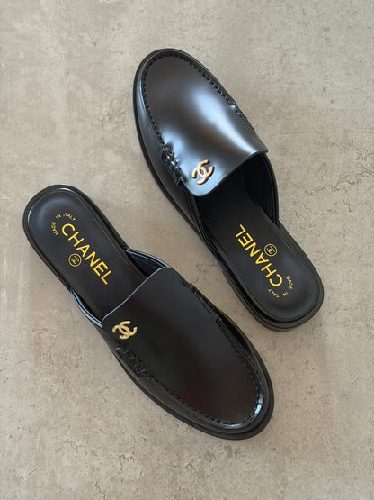 Chanel Mules in Black leather