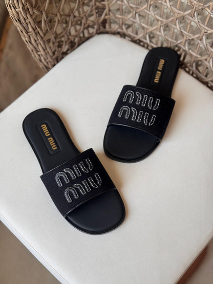 Miu Miu Canvas and leather slide sandals